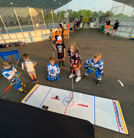 The SuperDekerPRO features a Hockey Defender Training Tool that uses blue lights to train stickhandling by taking points away if you touch a hockey defender light.