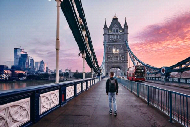 Man Walking in london beautiful night sky