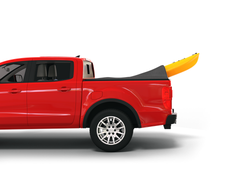 red ford ranger with tonneau cover over kayak
