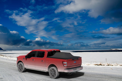 Red Ford F150 With Expanded Tonneau Cover