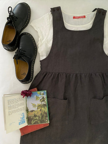 Pyne and Smith linen pinafore dress styled with Dr Martens