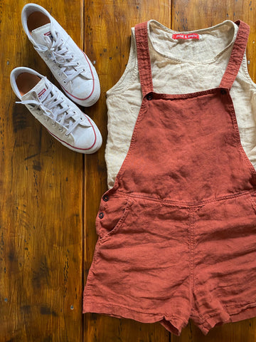 Pyne and Smith Shortalls in Devon Red with white converse sneakers