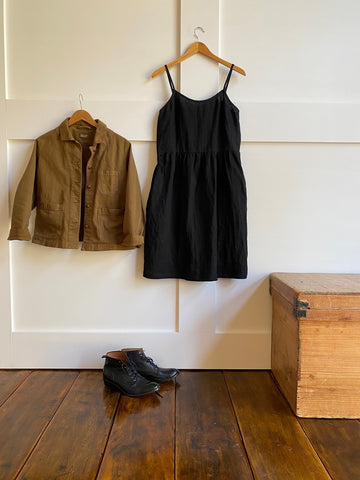 Pyne & Smith No. 34 dress in black linen with black lace boots and a boxy cut coat