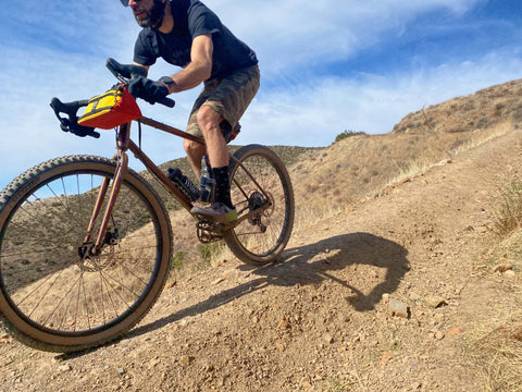 mountain biker riding downhill