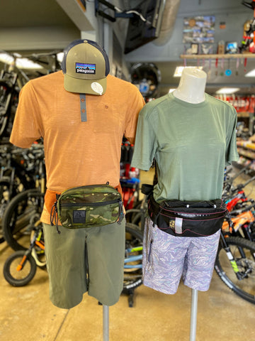 Patagonia mountain bike apparel and hydration packs on mannequins at our Tustin store. 