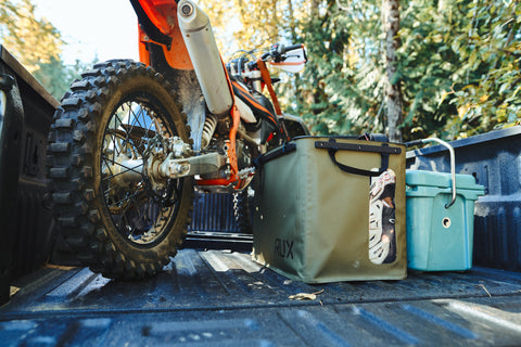 Mountain Bike next to the RUX 70L