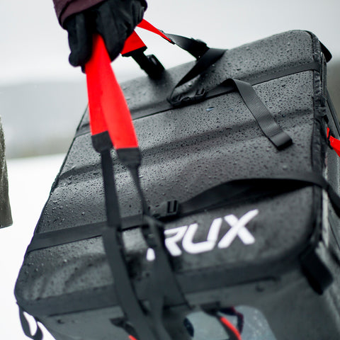 Carrying RUX 70L With Red Straps