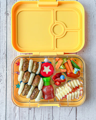 Yumbox bento box for kids with meatball skewers