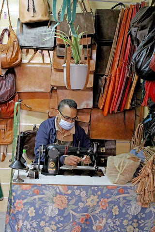 Abdou, our leather artisan partner at work in is shop