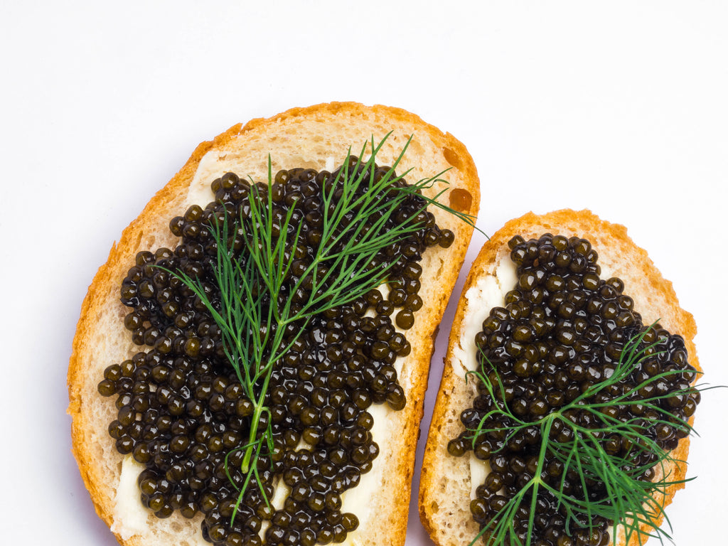 Prunier Kaviar mit Baguette