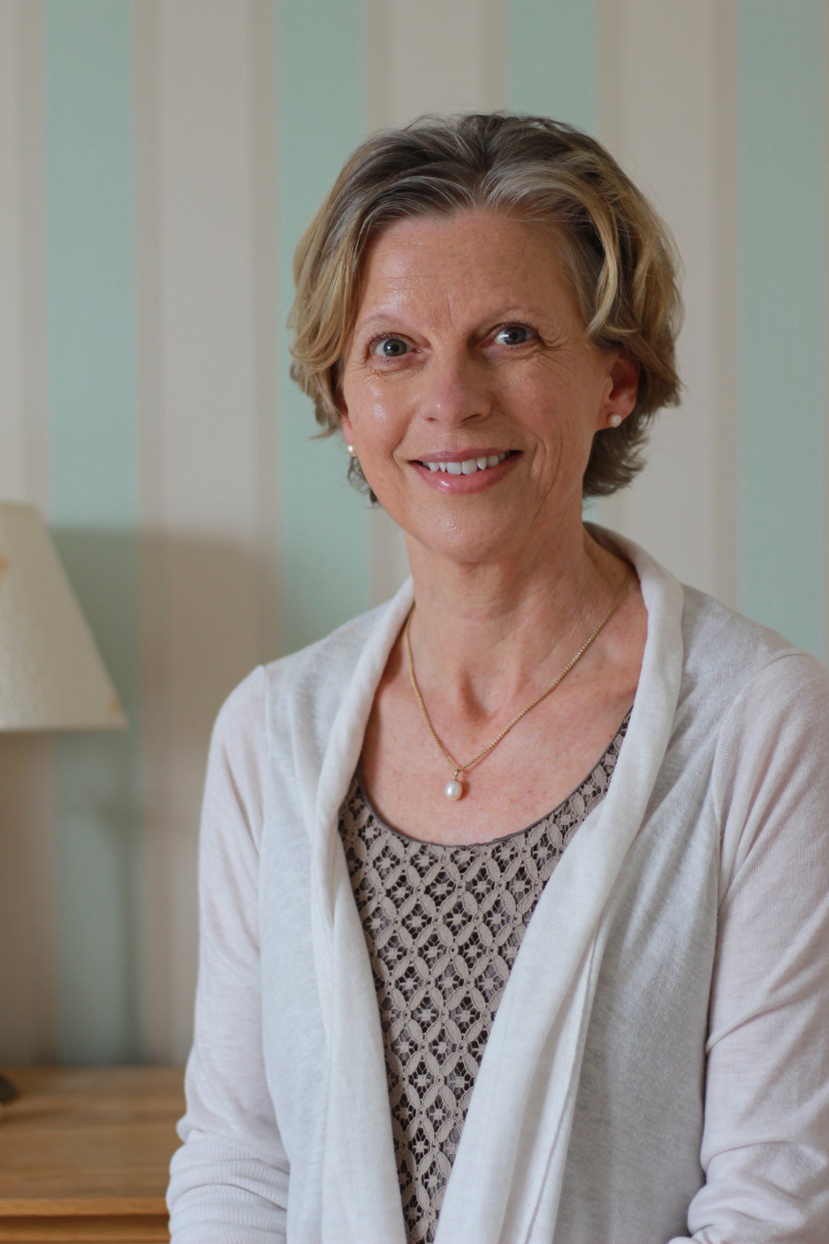 Menopausal woman smiling at camera