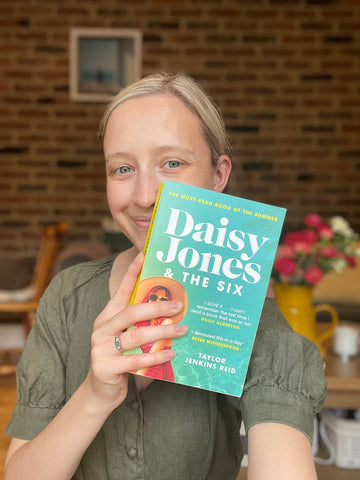 Lauren holding Daisy Jones and the Six Book