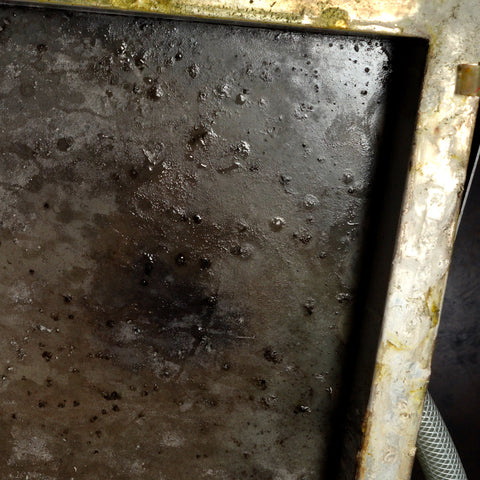 a screen with black gunk on it