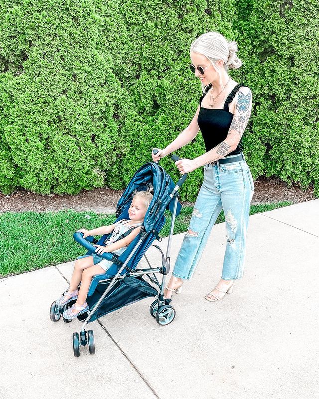 Brooke Hall in Nashville, Tennessee pushing her daughter in a stroller while exploring the city