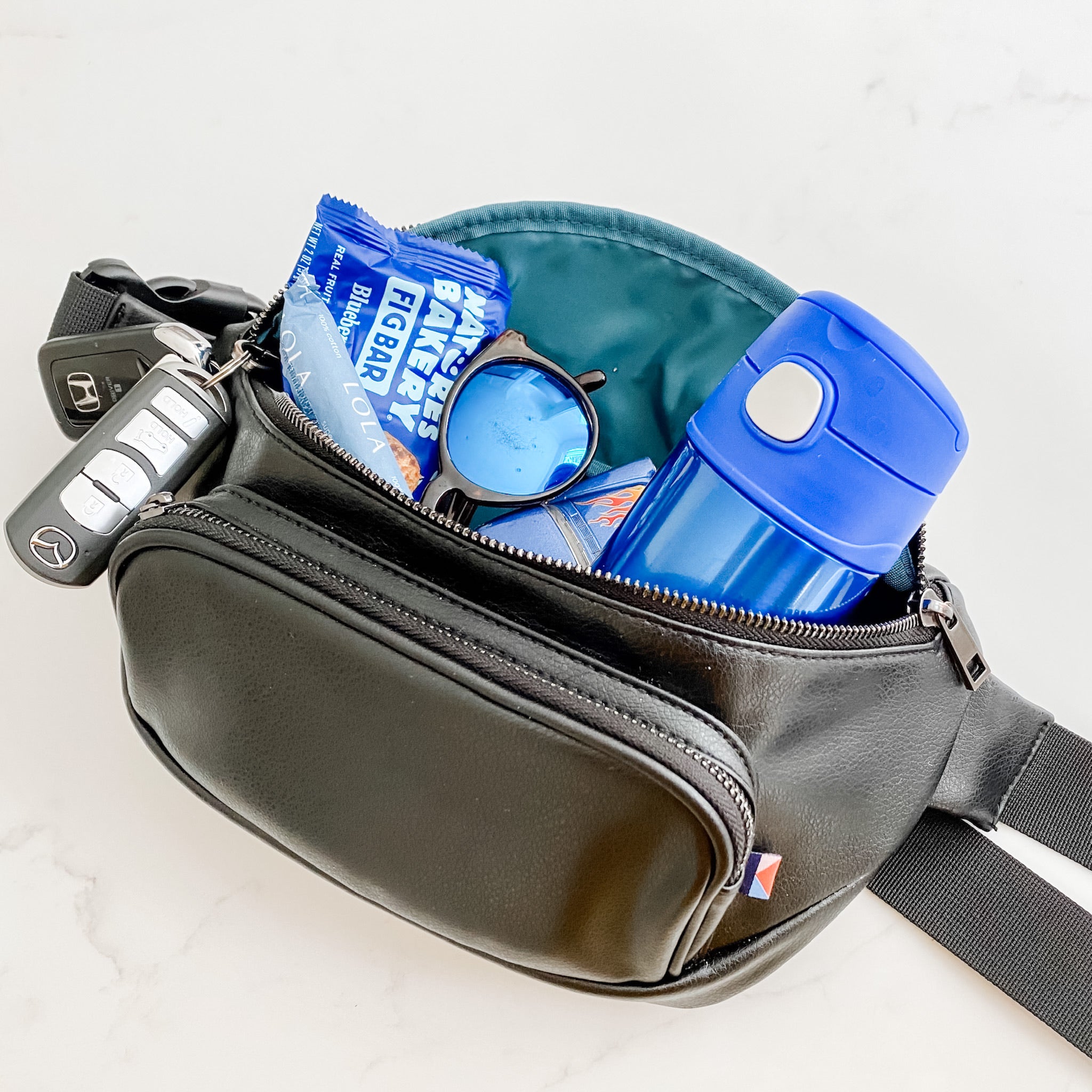 Travel fanny pack with all the travel essentials