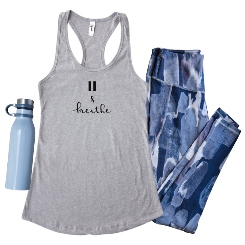 Pause (sign) & breathe in black text on a heather grey Next Level 1533 racerback tank top.