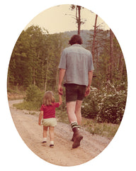dad and clare walking on road