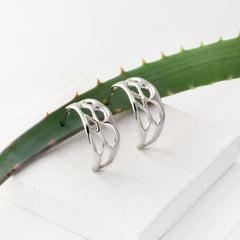 botanical hoop earrings on white background