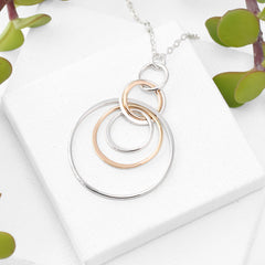layered gold and silver circle necklace