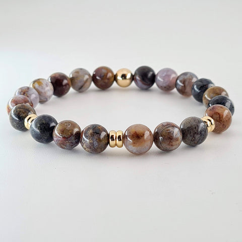 Pietersite crystal bracelet with gold accessories