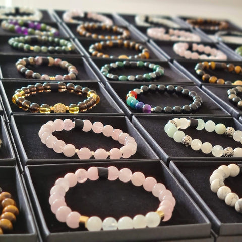 Rows of Samayla Jewellery gemstone bracelets packed in boxes