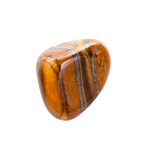 A Tiger Eye semi-precious gemstone. Its an orange-brown colour with dark brown stripes running through it.