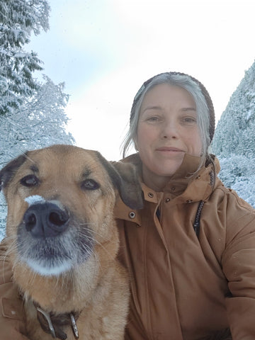 Image of the designer and maker Amanda Green with her dog.