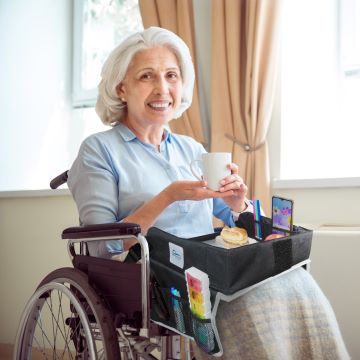 Happy elderly parent with mobility issue