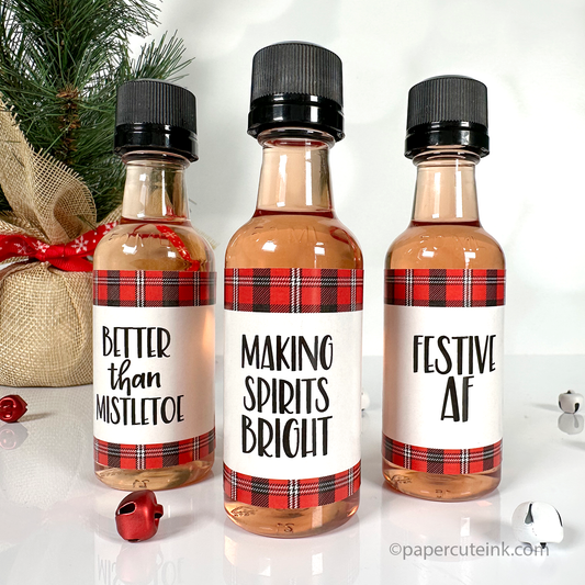 https://cdn.shopify.com/s/files/1/0314/5049/7083/products/red-plaid-holiday-liquor-bottle-labels.png?v=1667162278&width=533