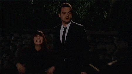 GIF of Zoe Deschanel freaking out and man staying calm