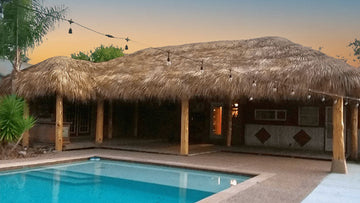 wood thatch tiki hut treated with fire retardant flame stop
