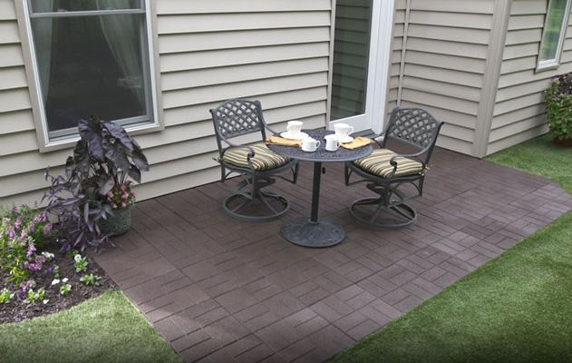 Rubberific Rubber Pavers covering a patio brown color