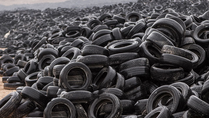 mound of used rubber car tires