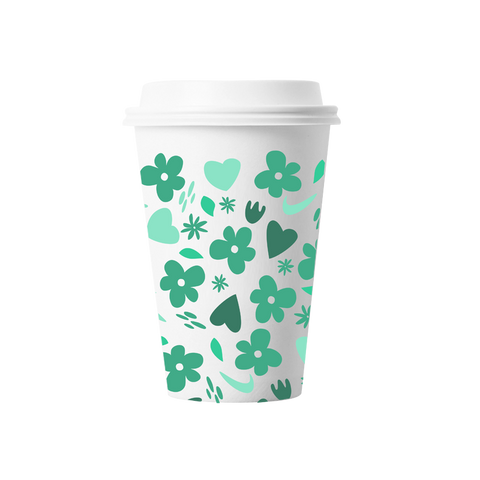 A disposable coffee cup with print on it