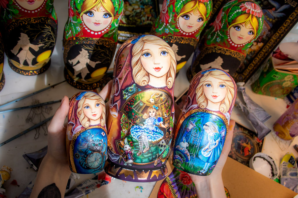 matryoshka dolls in hand