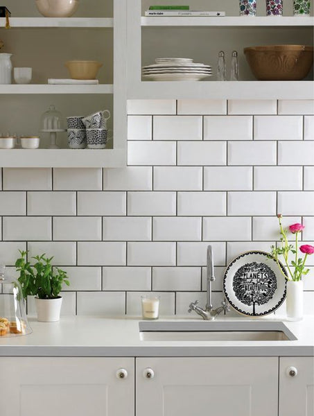 kitchen splashback with classic white subway tiles and dark grouting. 