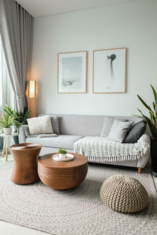 a cosy living room with earthly colours and white colour palette