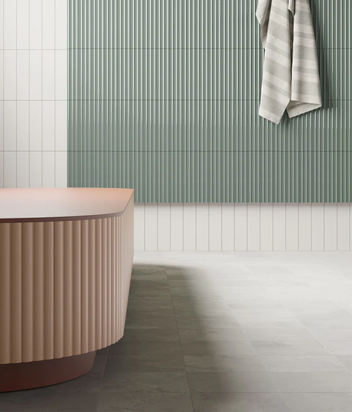 bathroom with linear lines mosaic tiles, and green and pink colour palette
