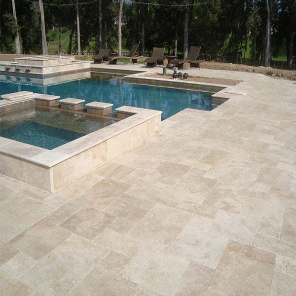 Outdoor stone paver around a swimming pool