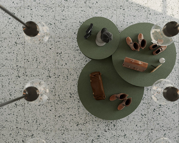 a top view of a retail store with grey and green terrazzo tiles