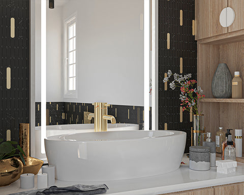 bathroom mirror and basin with dark stone mosaic tiles featured on the wall.