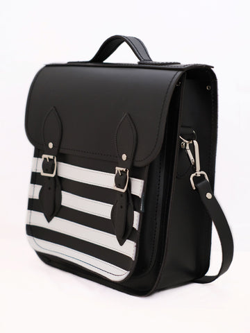 black and white striped backpack on a white background