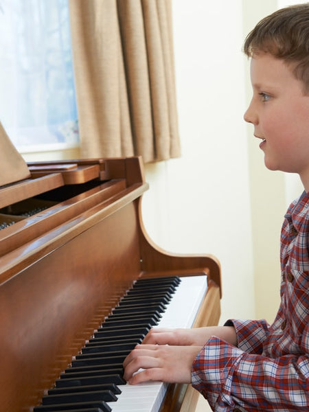 Young Boy Playing Piano