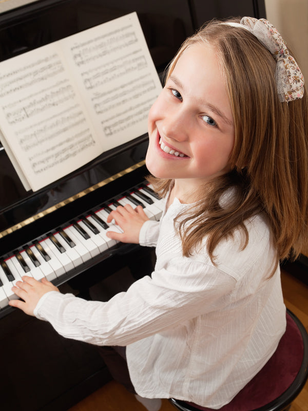 Young Girl Playing Piano