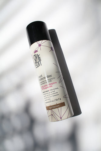 a bottle of style edit root concealer spray in light brown