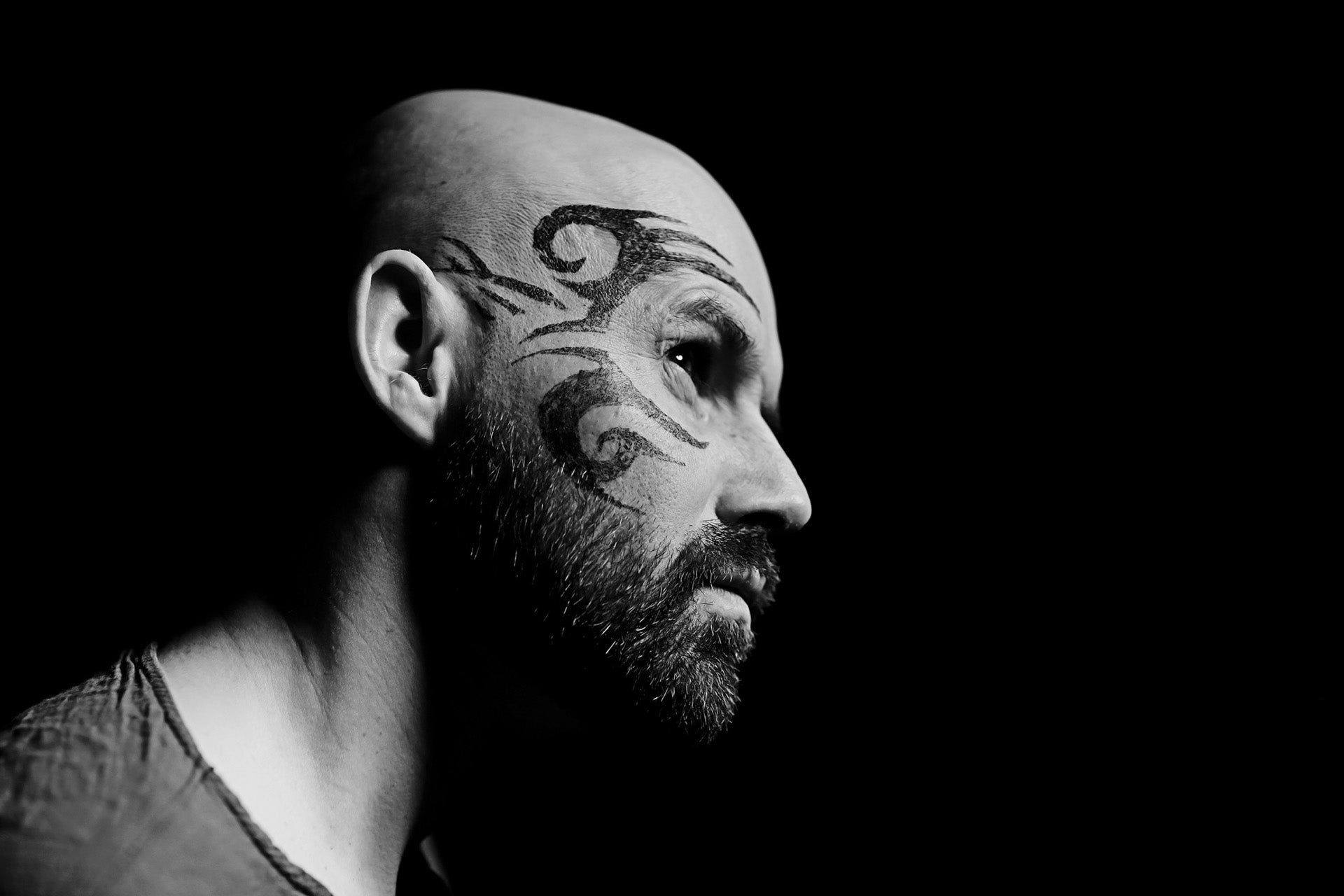 Guy Face Tattoo Black Background