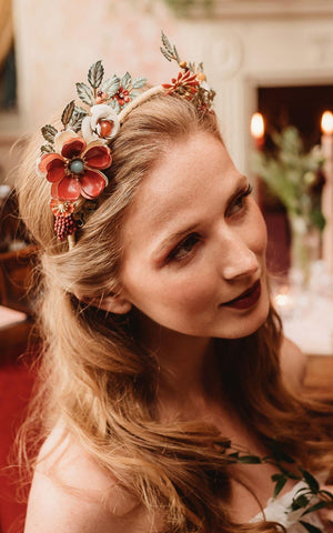 Bride wearing bespoke headdress from Bridgerton inspired autumnal wedding ideas