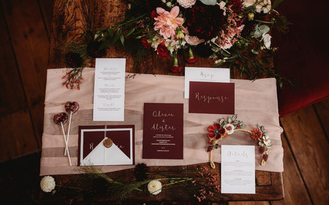 Modern yet classic wedding stationery in autumn colours of wine