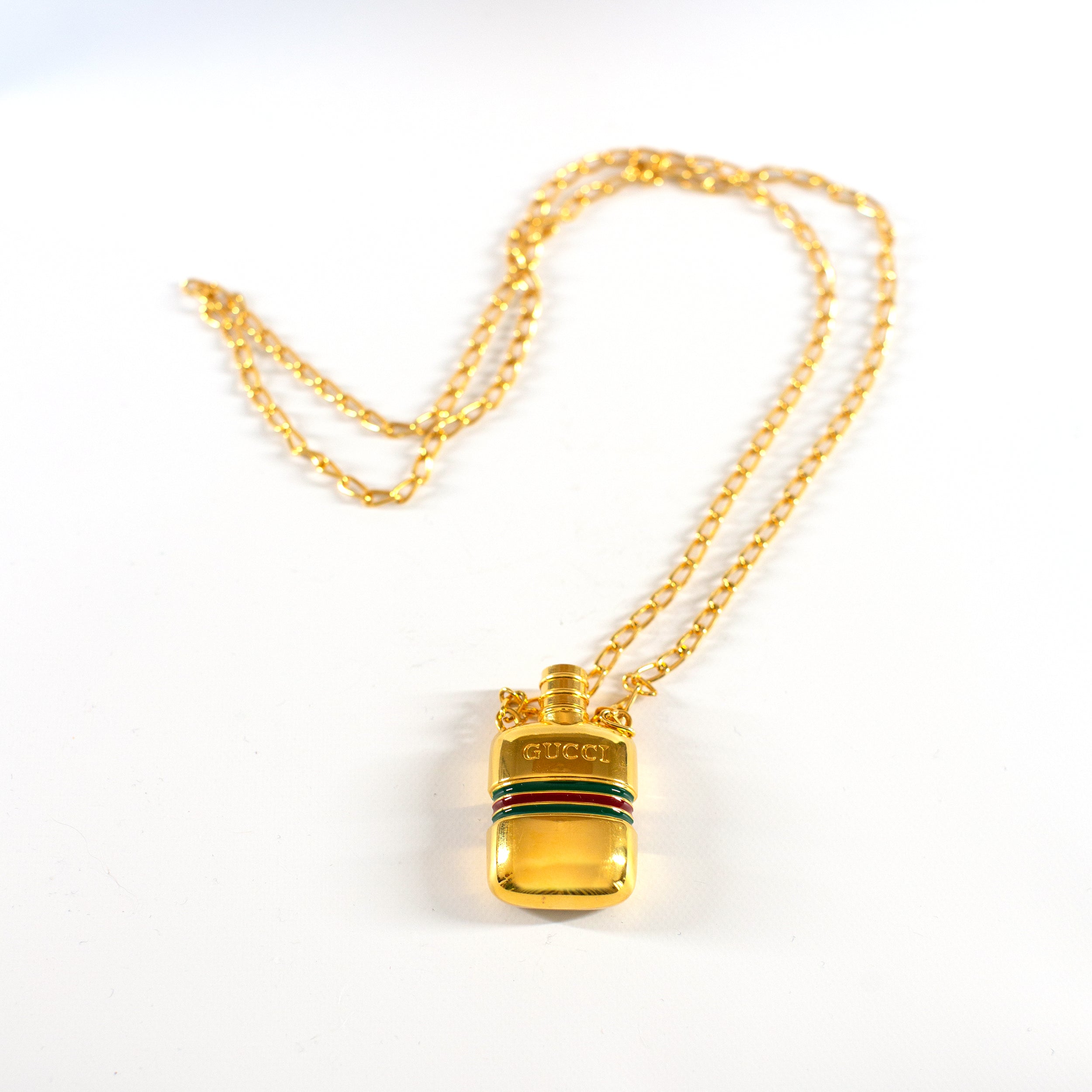 gucci perfume necklace