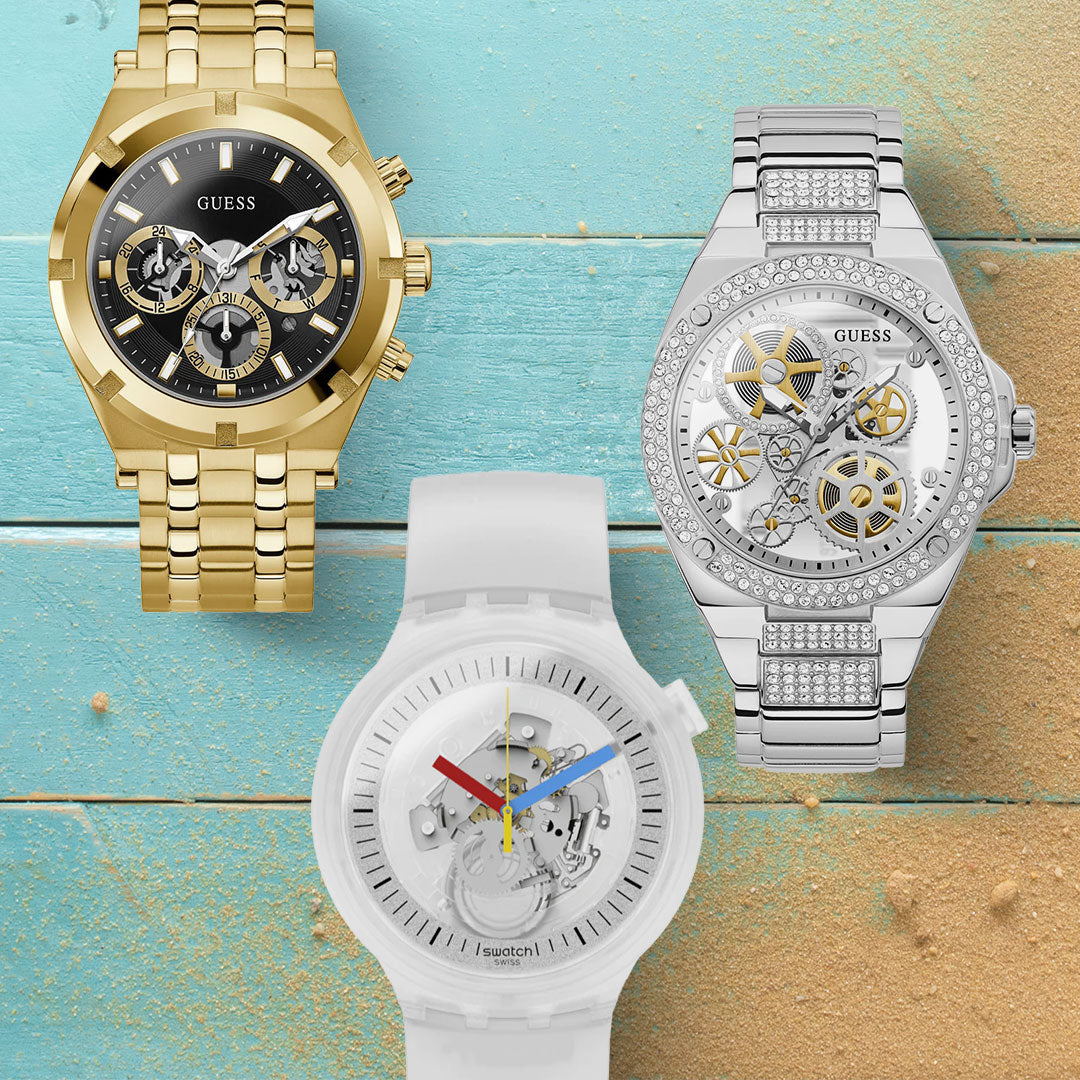 Left: Guess Men's Continental Gold Watch - £140.00. Centre: Swatch Clearly Bold Big Bold Unisex White Watch - £96.00. Right: Guess Men's Big Reveal Silver Watch - £161.00